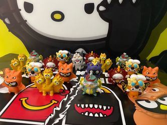 McDonalds Hello Kitty Godzilla collab happy meal toy figures