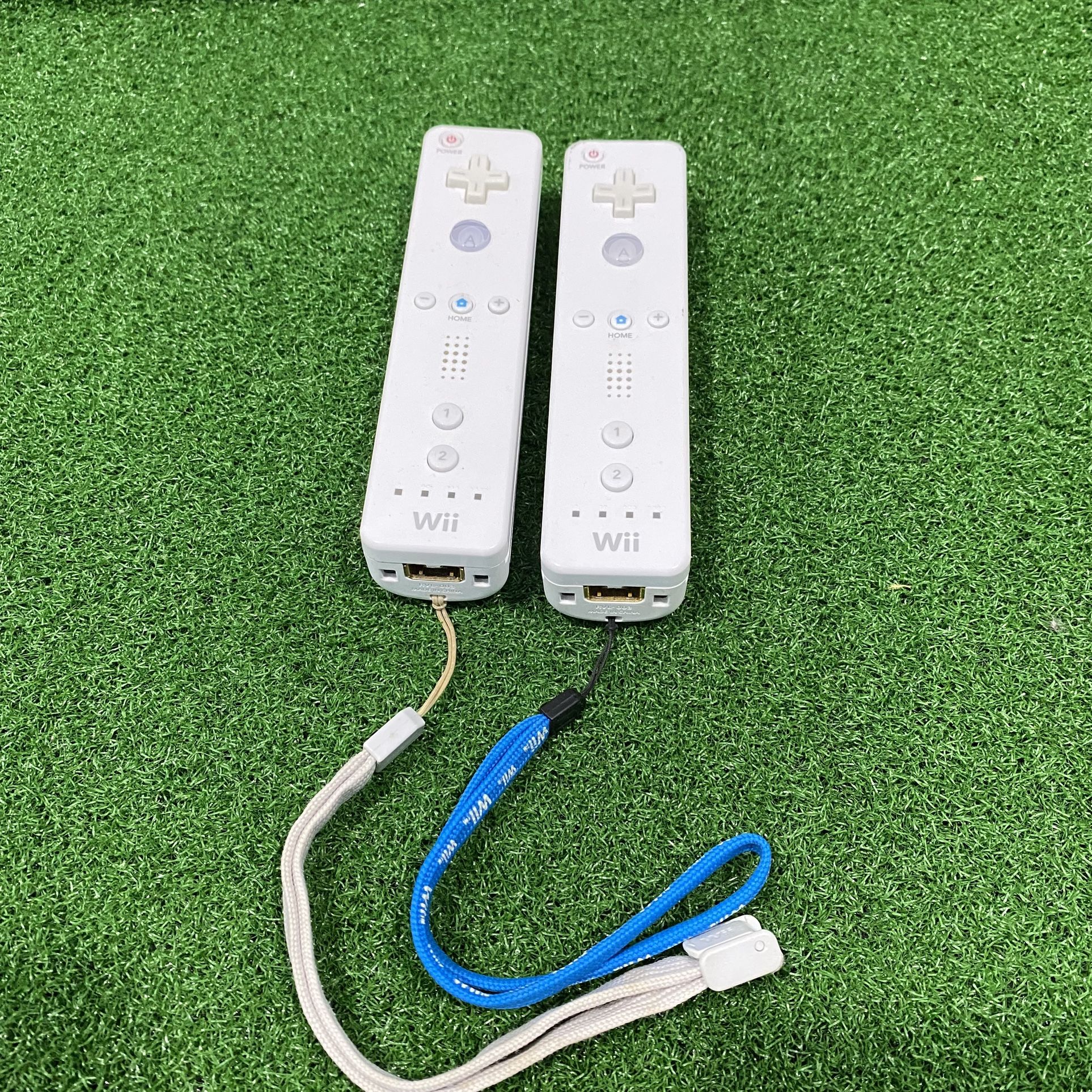 2 Nintendo Wii Remotes