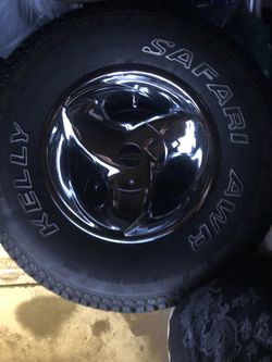 Dodge rims and tires Olmost new use like 2 mo on weekends only