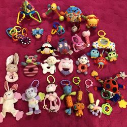 25 Baby Toddler Toys Rattles, Chimes, Many Can Also Be Hung From Hook, Some Have Movable Parts For Baby Development, Couple Have A Mirror, one toy mak