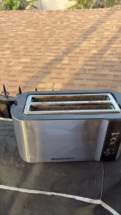 Elite Gourmet 4-Slice Toaster (Model ECT-3100, Model No. T-31U).