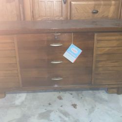 Cabinet the knobs are for decoration. You can use the inside for storage.
