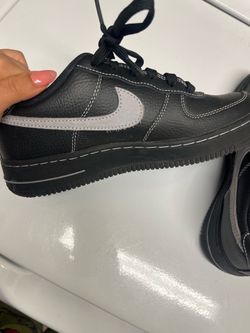 Black and grey Air Force’s  Size 5