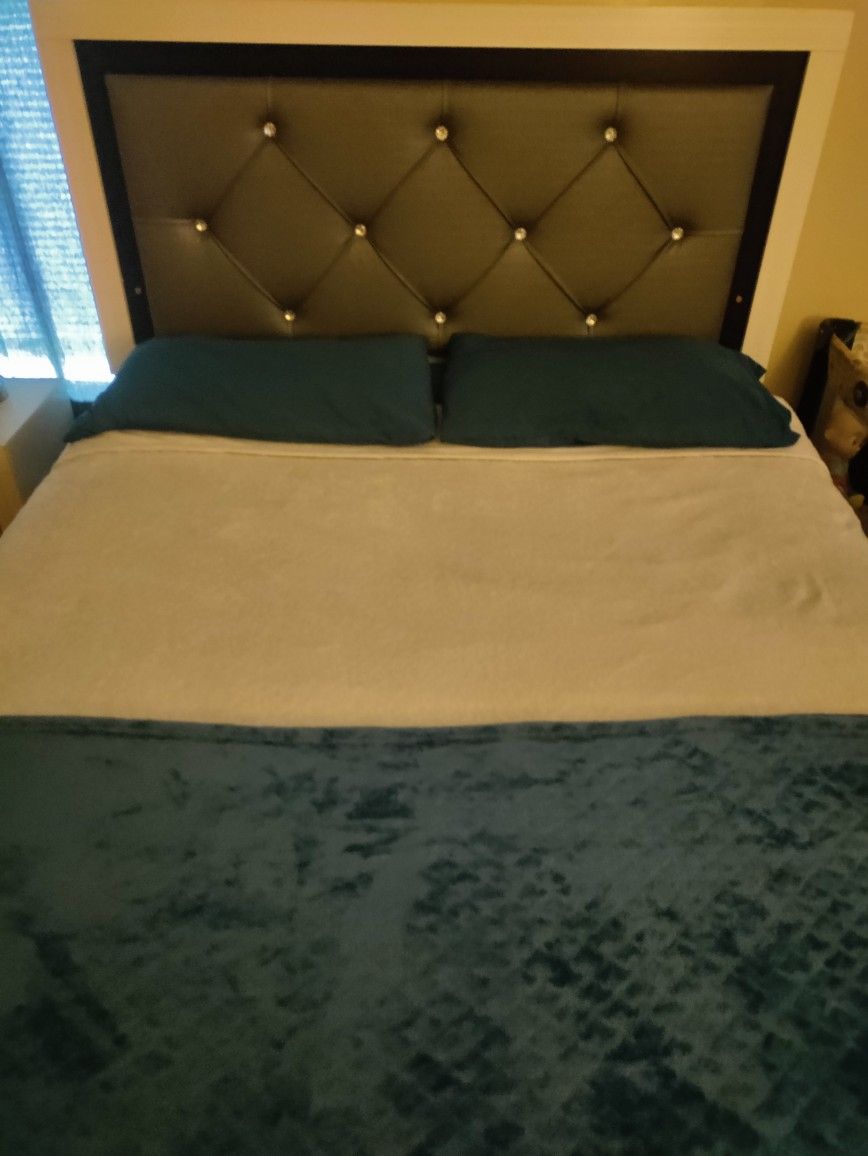 8 Piece Queen Bedroom Set With LED Lights On Bed