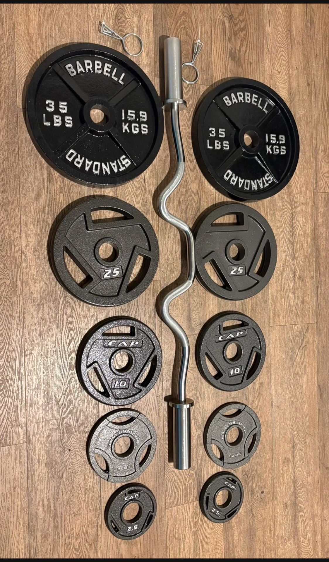 BRAND NEW Olympic Curl Bar With Pairs From 5s To 35s (total: 170 lbs)