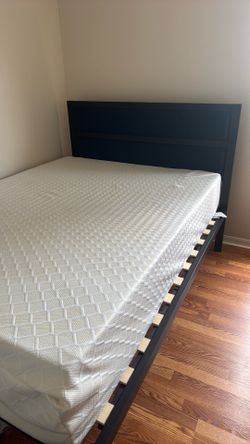 Queen sized bed and frame