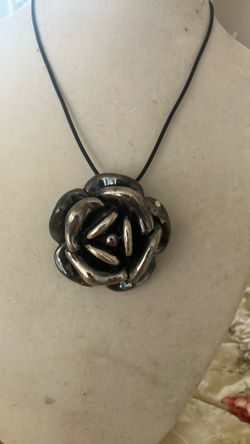 .925 hollowed out rose pendant