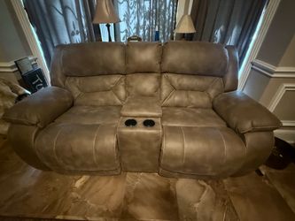 Matching pair of theater love seats with built-in massagers