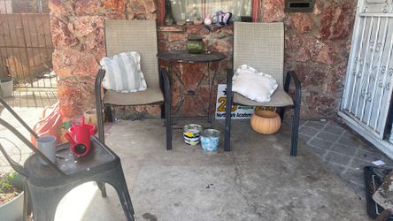 2 patio chairs and small table