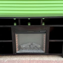 Tv stand with fireplace and remote control