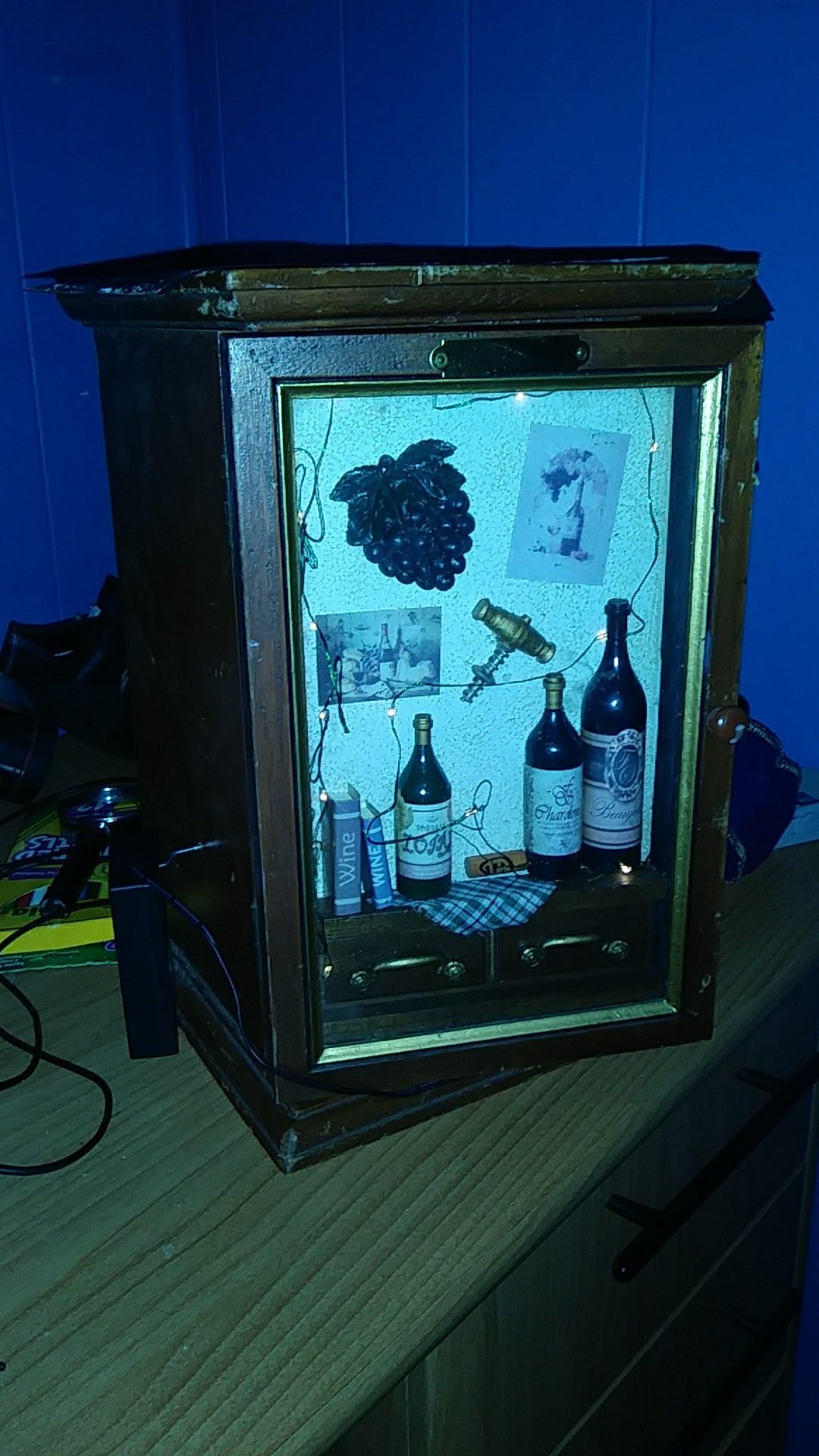 Its a decorative storage holder 4 smaller items to sit on your dresser or nightstand