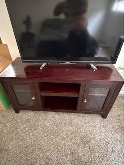 Dark wood tv stand