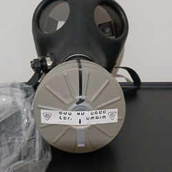  PAIR OF AUTHENTIC GAS MASKS  BRAND NEW