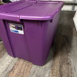 Large purple storage container with lock on lid