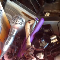 Lots of gently used hair irons and beauty accessories