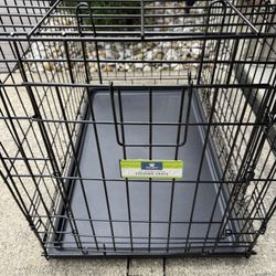 Medium Dog Crate in excellent shape!  31x20x22”.  With double doors.  