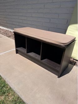 Storage bench with cushions