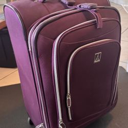 TravelPro Expandable Carry-On Rolling Luggage