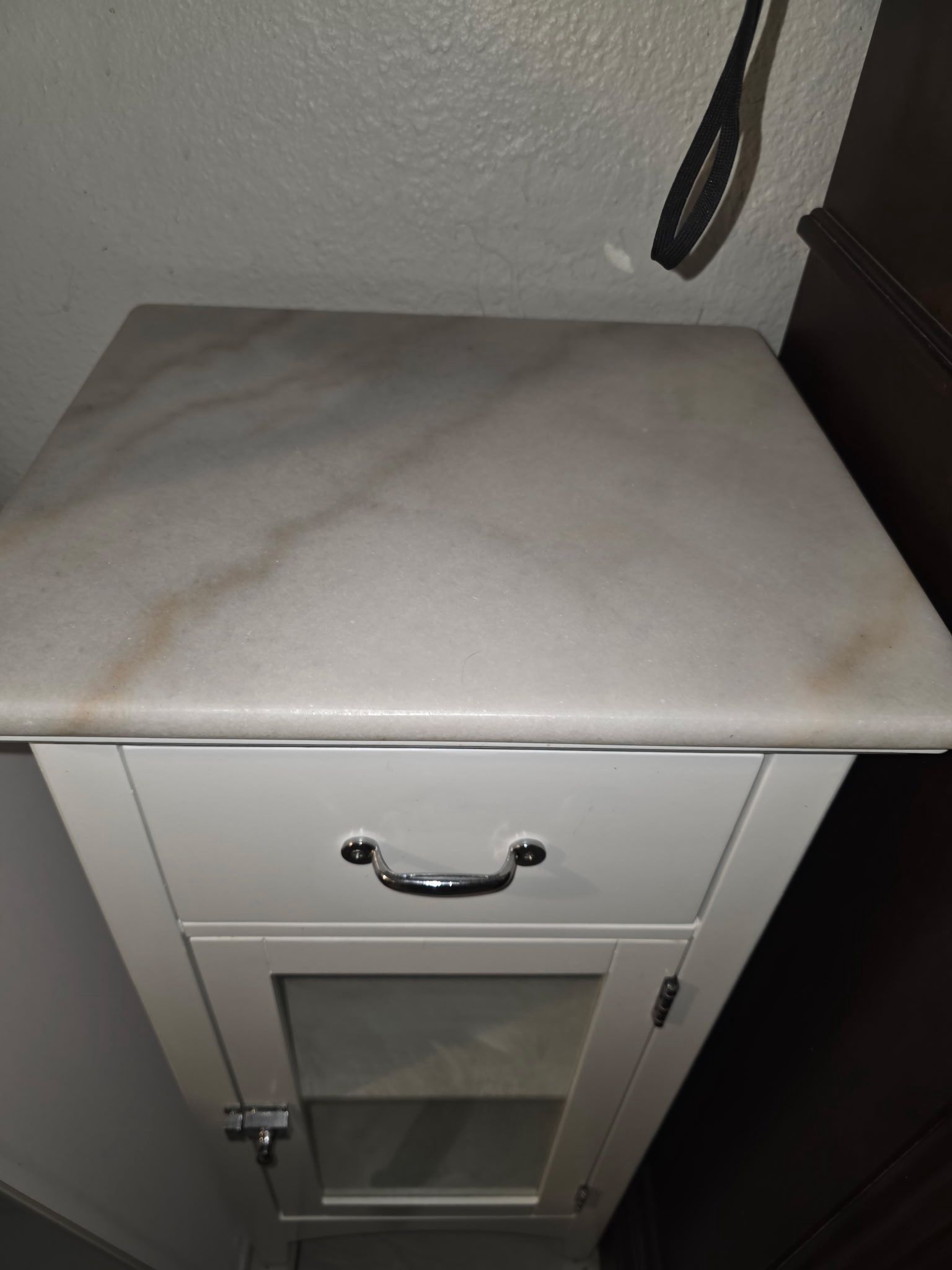 Bathroom Side Counter With Glass Door And Marble Top