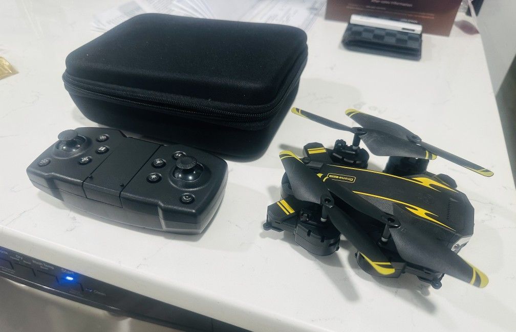 New High Quality Drone Built-in Camera Lights Bluetooth Enabled Extra Propellers Extra Wiring Comes With A Carrying Case And Controller