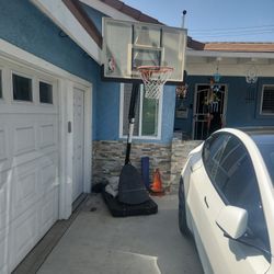 Adjustable Basketball Hoop $60 Solid Backboard 