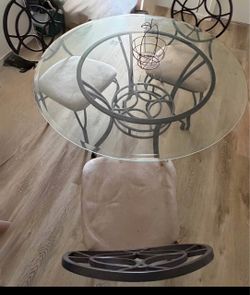 Round table with three chairs