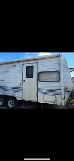 Small travel trailer.