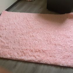 Pink Fuzzy Rug And Baby Hamper With Books And Toys