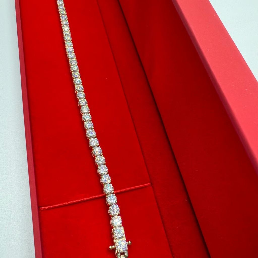 10KT Gold 4MM Tennis Braclet in 925 Silver with a CTW of 13.10