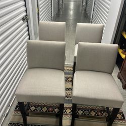 Four beige color,  height, dining chairs //Bar Stools