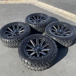 20” Chevy Silverado GMC Sierra Dodge Ram Ford F150 Raptor Fuel Wheels and 34” TOYO Mud-Terrain Tires