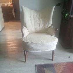 Comfortable Wingback Cream Colored  Chair