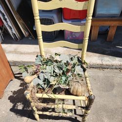 Whimsical Antique Distressed Chair with Faux  Greenery