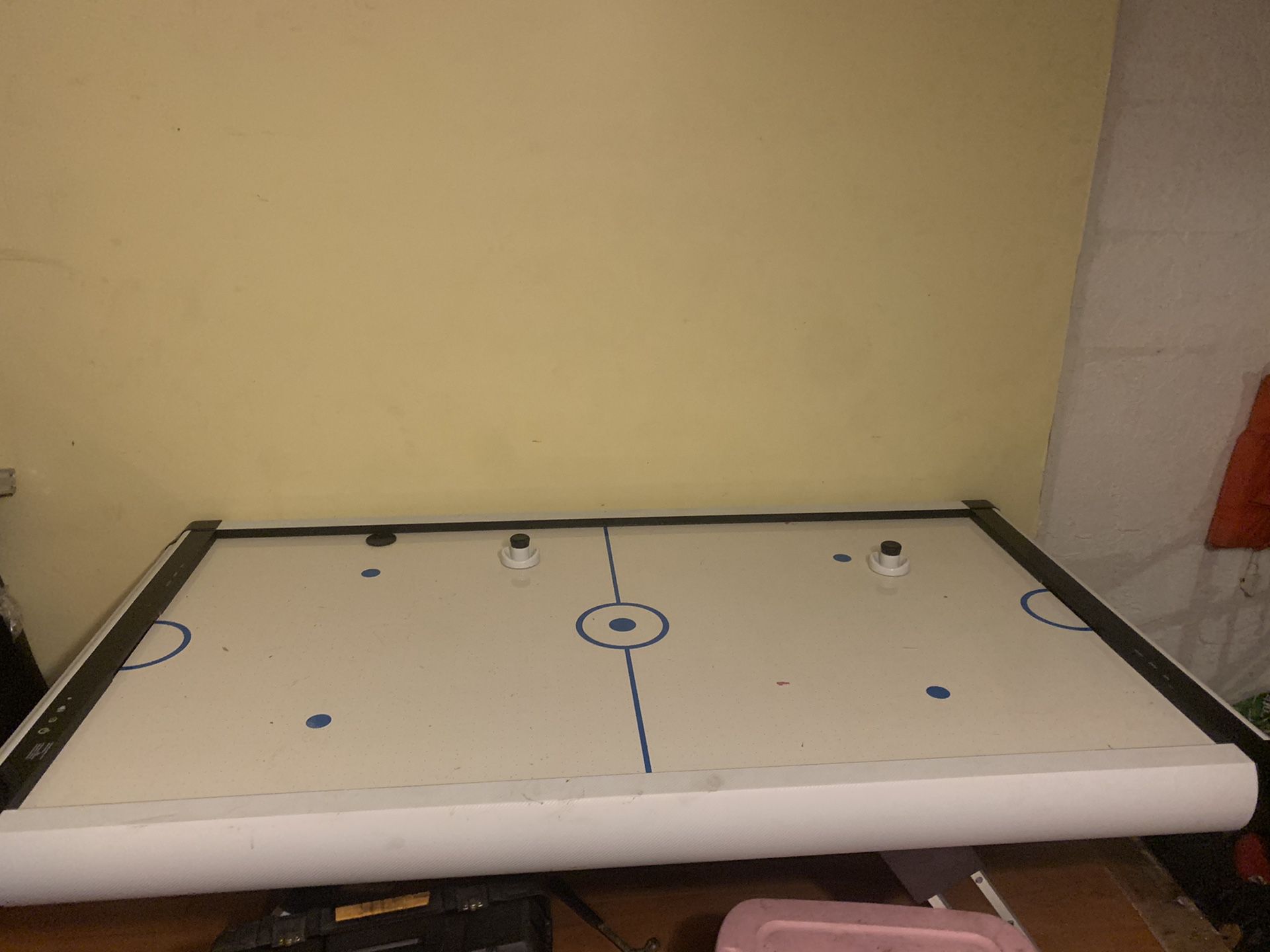 Professional grade air hockey table, Indoors and barely used.