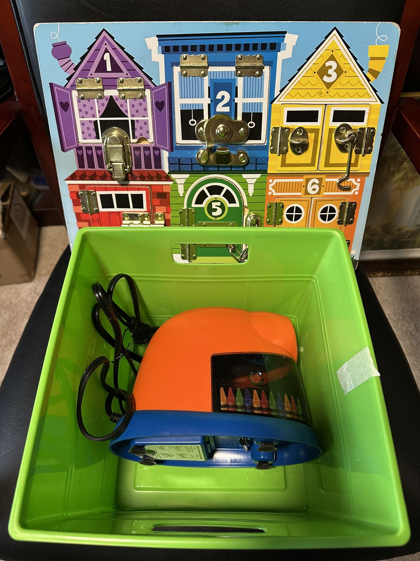Crayon Electric Sharpener and Melissa & Doug Latches Board and in a storage bin