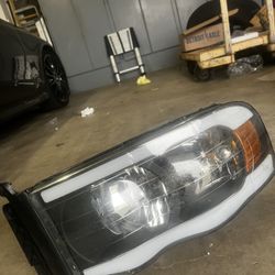 3RD generation ram 1500 driver side headlight