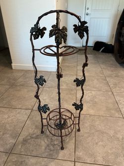 Vintage metal grape leaf design wine rack