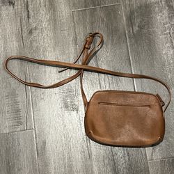 Brown leather crossbody bag with adjustable strap
