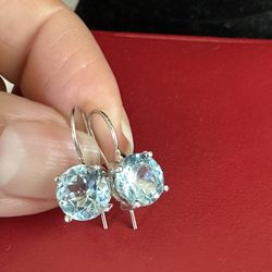 Gorgeous 925 Sterling silver genuine blue topaz drop hook earrings , marked 925 Avon , these gemstones are tested in photos