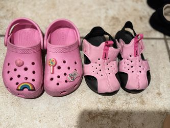 Pink Crocs And Nike Sandals