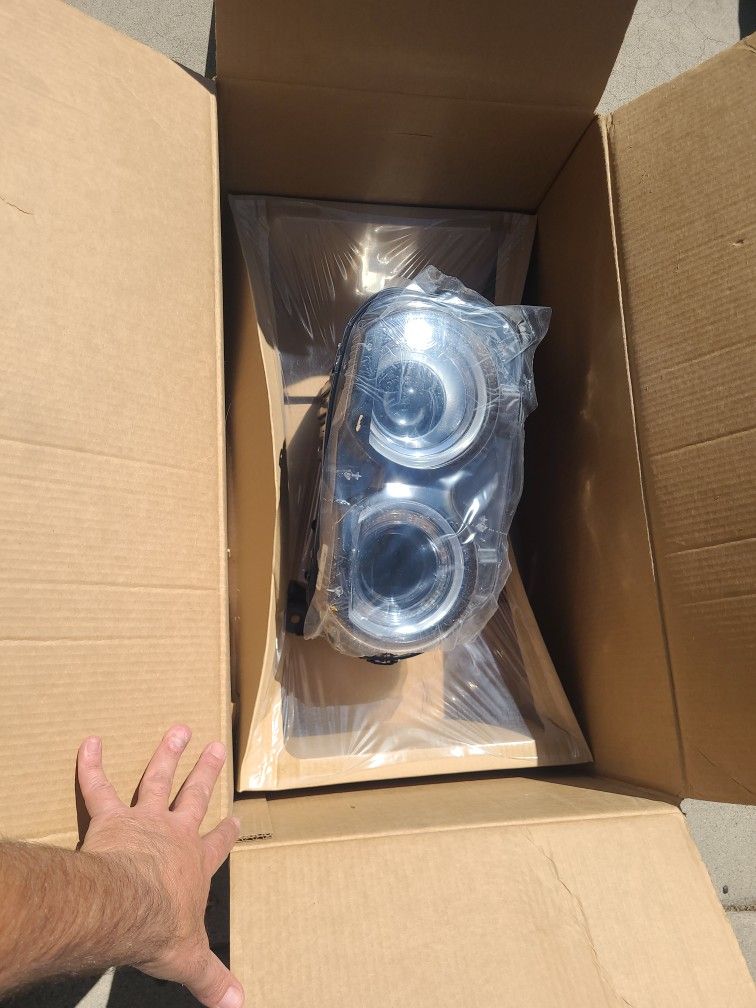 Challenger OEM Left Side Headlight (New)