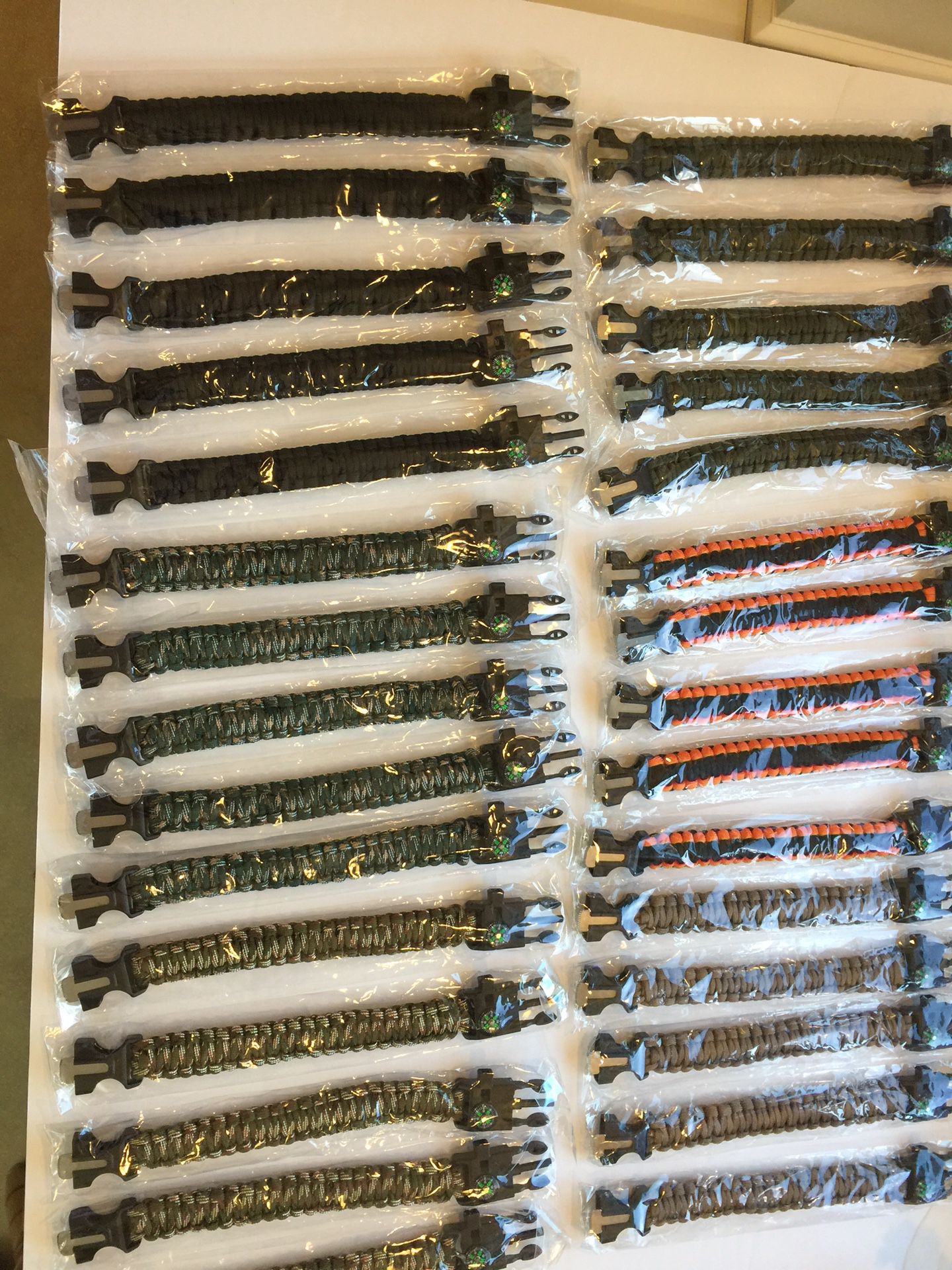 30 survival bracelets all brand new could be used at a resale shop Assorted colors