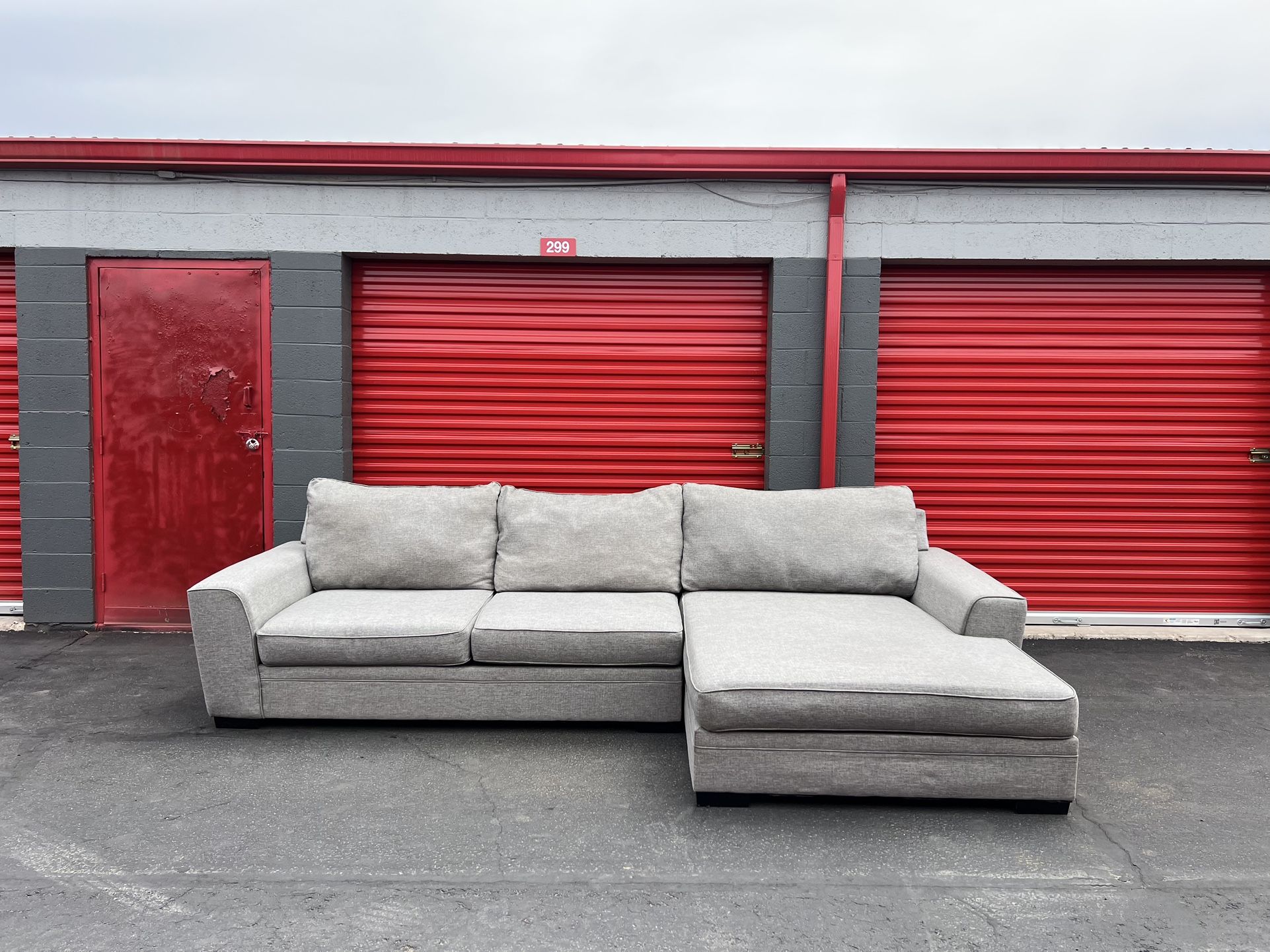 Grey Living Spaces Sectional Couch with Free Delivery