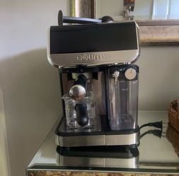 Coffee maker with milk frother