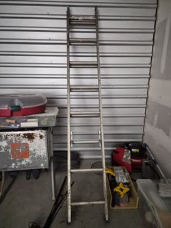 Ladder And Surfboard