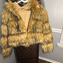 Tan and brown faux fur coat with hood #fauxfur #wintercoat
