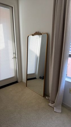 Beautiful gold floor mirror