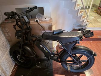 Brand: OUXI * Model: V8 * Type: Electric Fat Tire Bike / Moped-style e-bike * Motor: 750W Brushless — US model specifies a peak of approximately 1,000