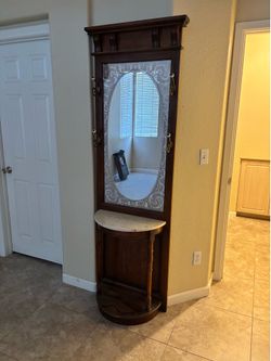 Antique mirror and hat holder