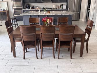 9 piece solid wood dining table and chairs (cost plus)